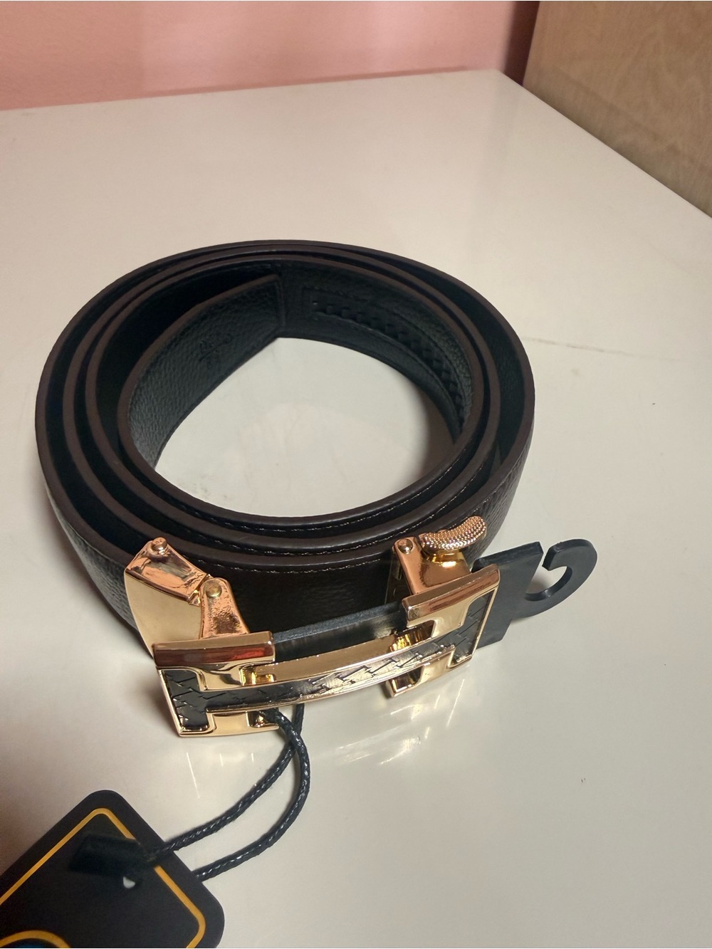 Men's Black Leather Belt with Gold Buckle
Size 42-44 easy cut smaller size